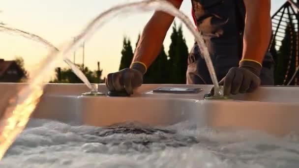 Caucasian Professional Hot Tubs Technician Finishing Garden Spa Installation Residential — Stock video