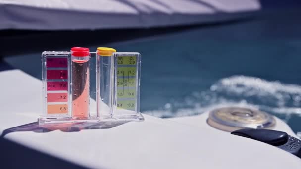 Hot Tub Water Quality Check Using Chemical Testing Kit — Stock video