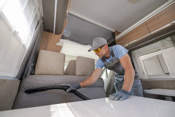 Caucasian Middle Aged Man Cleaning Interior Camper Van Vacuuming Folding — Stok fotoğraf