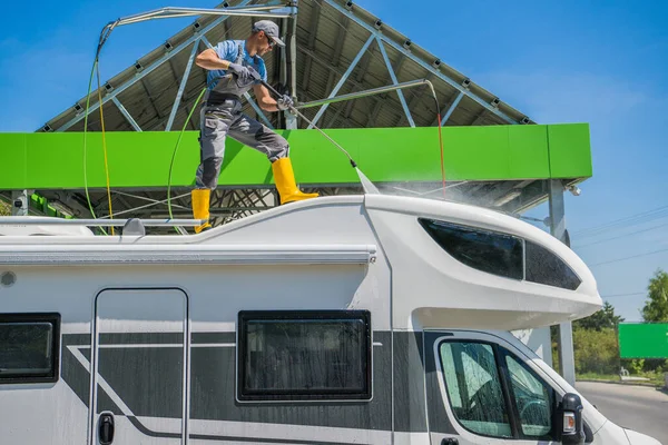 Middle Aged Man Yellow Rubber Boots Pressure Washing Roof His — Stockfoto