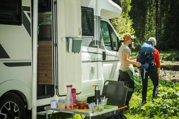 Caucasian Camping Couple Next Class Motor Home Preparing Hike Recreational — Zdjęcie stockowe