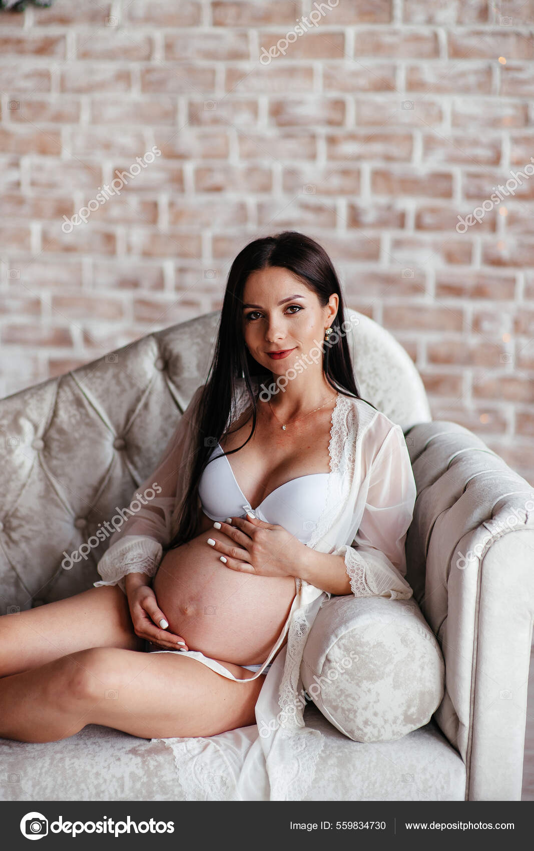 Beautiful Young Sexy Pregnant Woman Wearing White Lingerie Lying Sofa Stock Photo by ©fotofrol 559834730