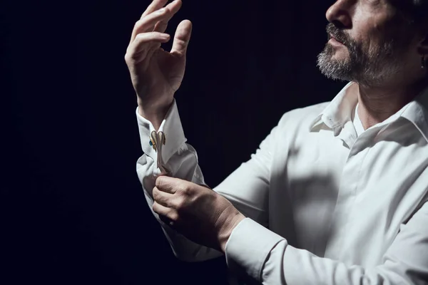 Man Fastens His Cufflinks Sleeves White Shirt Dark Background — Stock Fotó