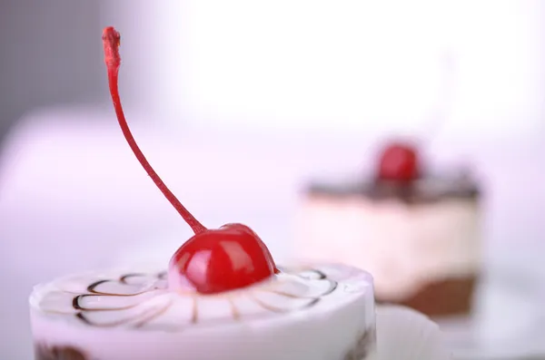 Tasty cupcakes on grey background — Stock Photo, Image