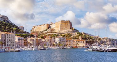Landscape with Bonifacio harbor and town in Corsica island, France