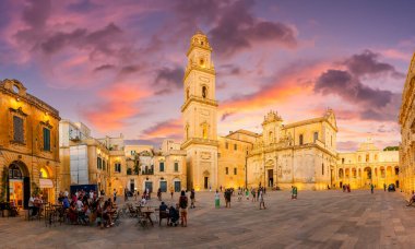 LECCE, ITALY - JULY 20, 2022: Piazza del Duomo square and Virgin Mary Cathedral at twilight time, Puglia region, southern Italy