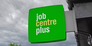 Newcastle upon Tyne, United Kingdom, 13 July 2022 - Exterior view of the Jobcentre Plus in the centre of Newcastle. People visit the employment center. Offices of Jobcentre Plus exterior.