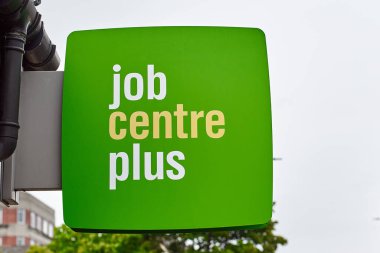 Newcastle upon Tyne, United Kingdom, 13 July 2022 - Exterior view of the Jobcentre Plus in the centre of Newcastle. People visit the employment center. Offices of Jobcentre Plus exterior.