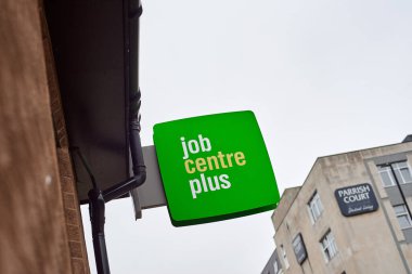 Newcastle upon Tyne, United Kingdom, 13 July 2022 - Exterior view of the Jobcentre Plus in the centre of Newcastle. People visit the employment center. Offices of Jobcentre Plus exterior.