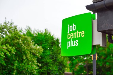 Newcastle upon Tyne, United Kingdom, 13 July 2022 - Exterior view of the Jobcentre Plus in the centre of Newcastle. People visit the employment center. Offices of Jobcentre Plus exterior.