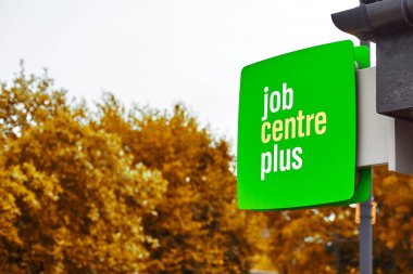 Newcastle upon Tyne, United Kingdom, 13 July 2022 - Exterior view of the Jobcentre Plus in the centre of Newcastle. People visit the employment center. Offices of Jobcentre Plus exterior.