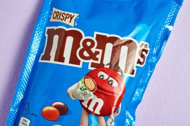 New pack of MMs on a lavender background. new MMs crispy.