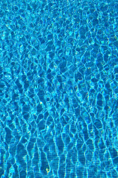 Swimming pool with sunny reflections — Stock Photo, Image