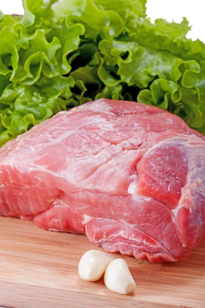 Fläsk. färsk rå kött och vitlök — Stockfoto