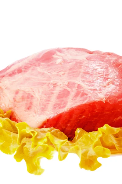 Frisches rohes Schweinefleisch und Salat isoliert auf weißem Hintergrund — Stockfoto