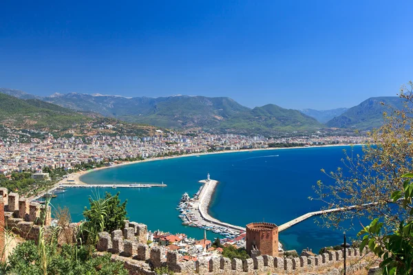 Beautiful view of city Alanya in Turkey. Red tower and harbor — Stock Photo, Image