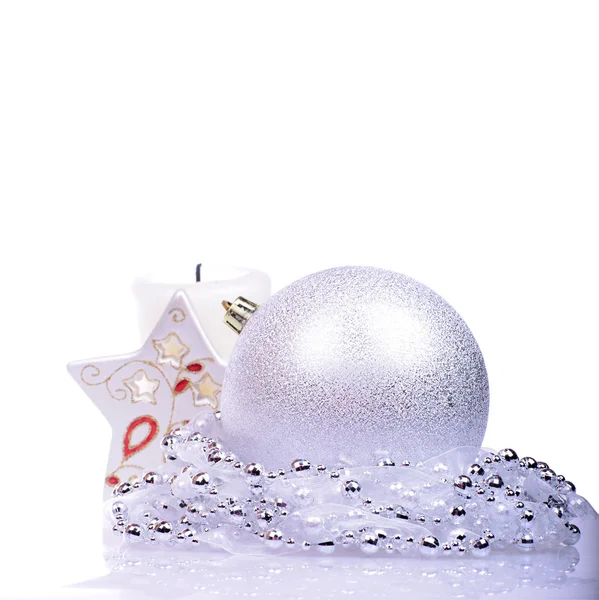 Christmas background with balls and candle isolated on the white background — Stock Photo, Image