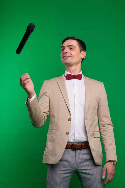 Entertainer Young Elegant Talking Man Holding Microphone Isolated Studio — Stock Photo, Image