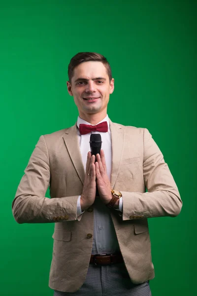 Portrait Male Announcer Holding Microphone Isolated Green White Background — Stock Photo, Image