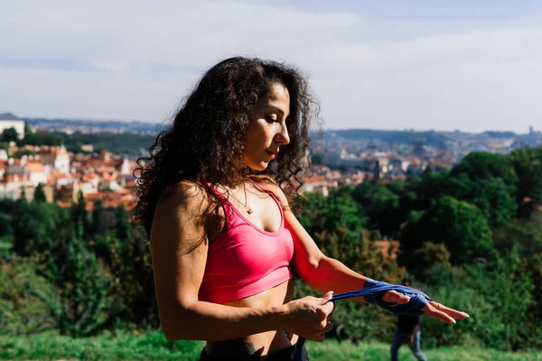 Woman power, self defence concept. Portrait of an attractive serious fit boxer, ready for fight