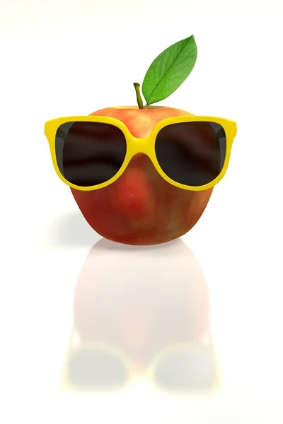 Красное яблоко в желтых солнечных очках — стоковое фото