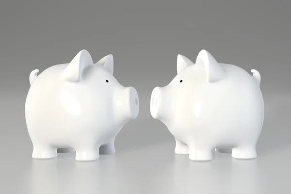 Piggy bank - vis á vis Jogdíjmentes Stock Fotók