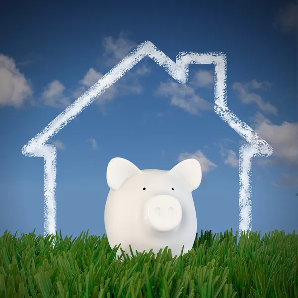 Piggy bank - drawn house in the sky — Stock Photo, Image