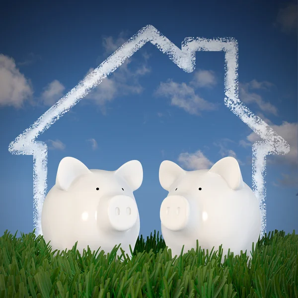 Piggy bank - two pigs with drawn house in the sky — Stock Photo, Image