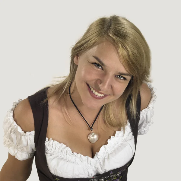 Woman in a dirndl — Stock Photo, Image