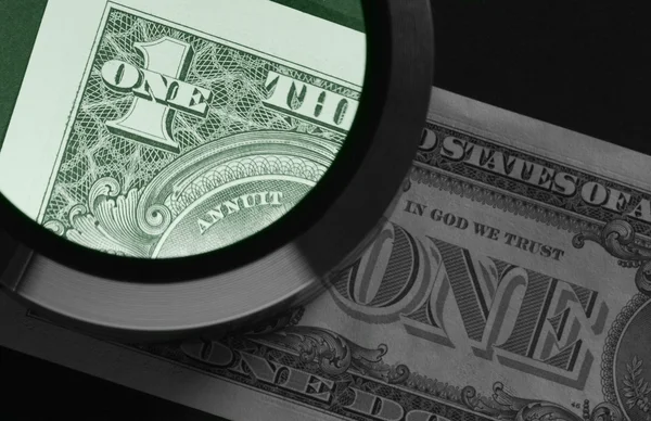 Dollar and magnifier — Stock Photo, Image