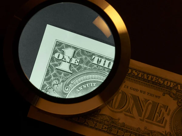 Dollar and magnifier — Stock Photo, Image