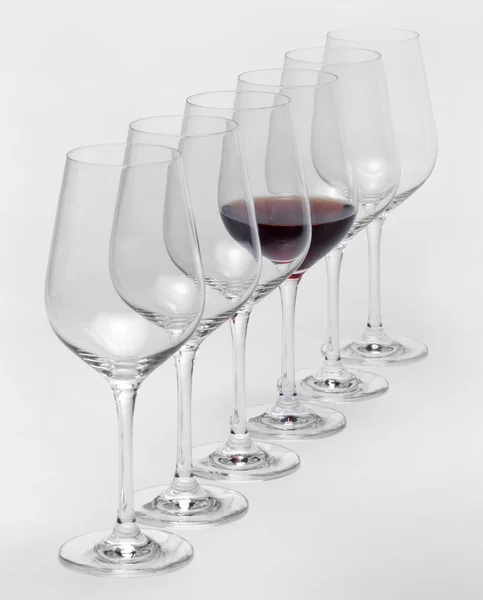 Wine glasses in a row — Stock Photo, Image