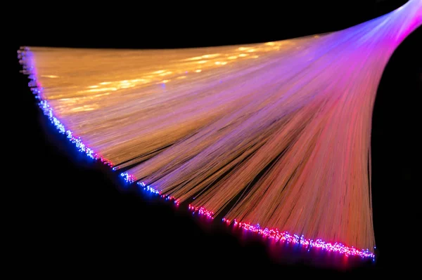 Illuminated Fanned Out Optical Fibers Closeup Dark Back — Stock Photo, Image