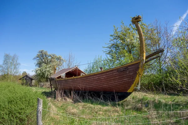 Medieval viking longboat in sunny ambiance at early spring time