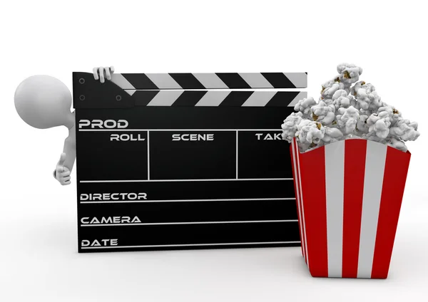 Man looking through the movie clapper and popcorn — Stock Photo, Image