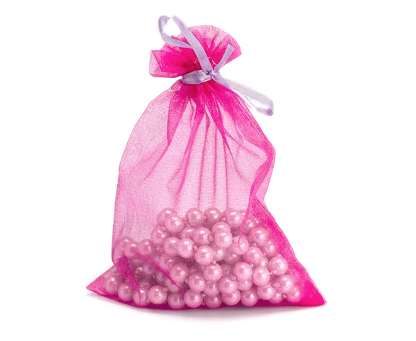 Bag with pearls on a white background — Stock Photo, Image