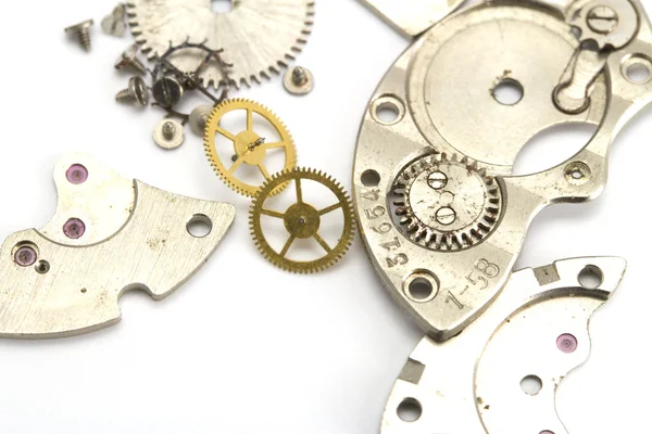 Clockwork details op een witte achtergrond — Stockfoto