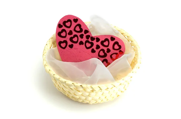 Hearts and cloth in a basket — Stock Photo, Image