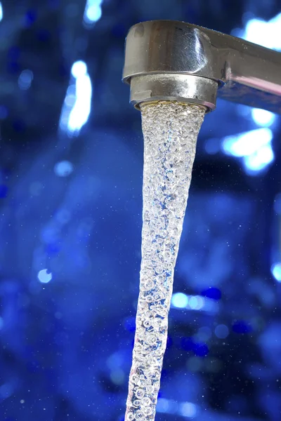 Water flowing from the tap — Stock Photo, Image