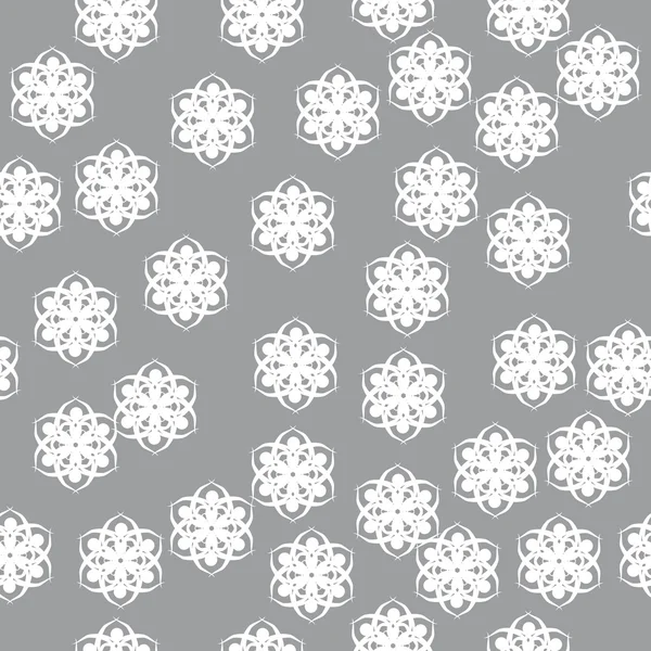Abstraktes Vektormuster mit einer Reihe schöner Schneeflocken. — Stockvektor