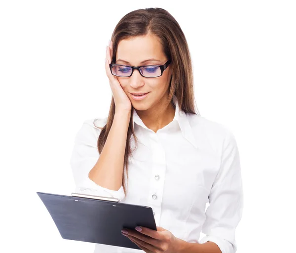 Lovely surprised businesswoman with clipboard — Stock Photo, Image