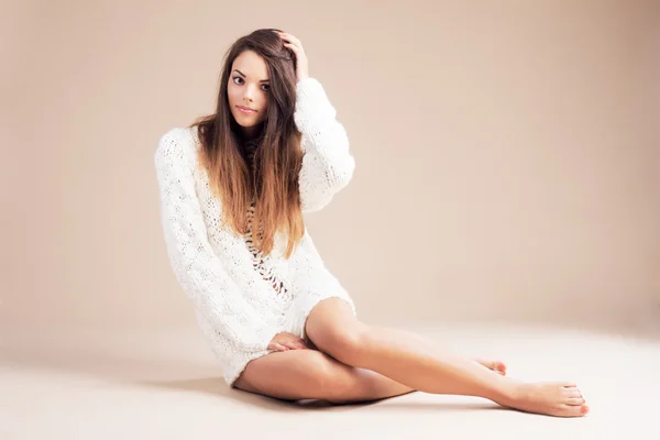 Woman in white woolen sweater — Stock Photo, Image