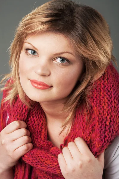 Woman in big pink scarf Stock Image