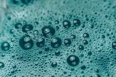 Tasarım için güzel soyut yeşil baloncuklar arka plan deseni. Arkaplan, pankart için sıvı dokusu.