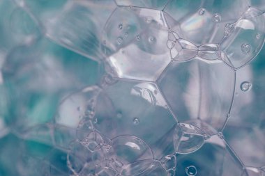 Güzel, soyut sabun köpüklerini kapatın. Tasarım için arkaplan modeli. Makro fotoğrafçılık görünümü.