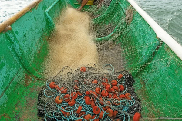 Boat and fishing net — Stock Photo, Image