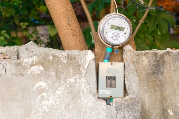 Electric meter on the wall Stock Image