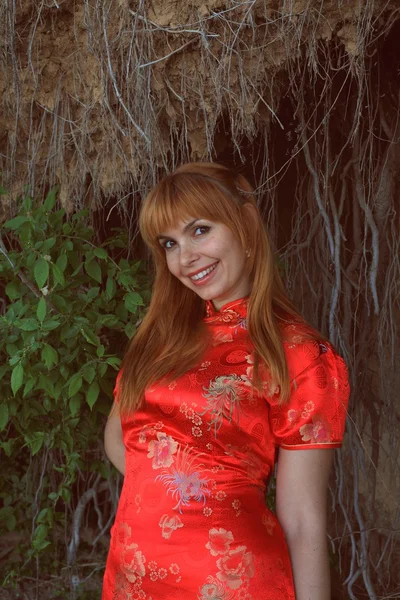 Girl in red dress — Stock Photo, Image