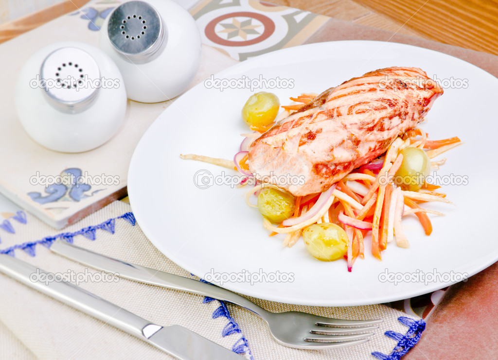 fried salmon steak with pickled grapes and ginger