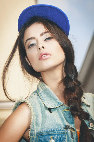 Closeup of Young sexy woman in blue cap — Stock Photo, Image